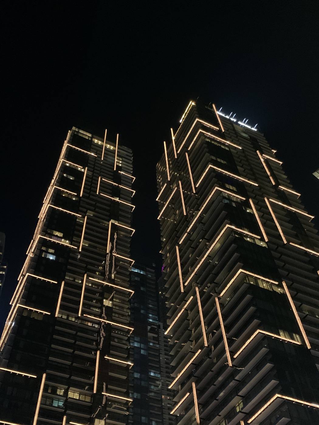 Dubai Marina towers illuminated at night